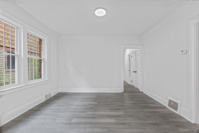 12242 Washburn St, Detroit, MI 48204 - empty room with baseboards and wood finished floors