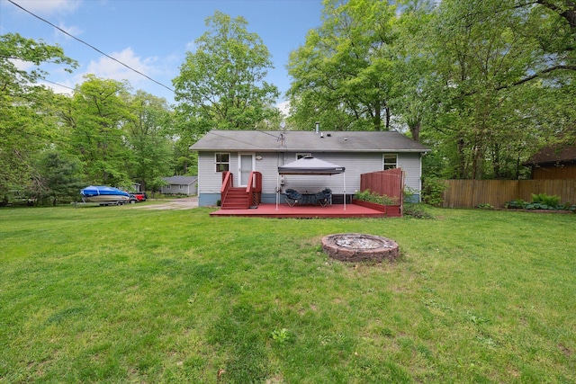 6544 Woodland Rd, Whitmore Lake, MI 48189 - back of property featuring a deck
