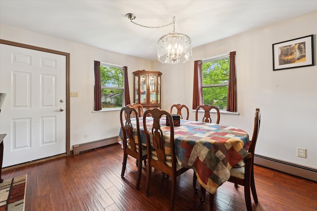 6544 Woodland Rd, Whitmore Lake, MI 48189 - dining space featuring a baseboard radiator, healthy amount of natural light, and a chandelier
