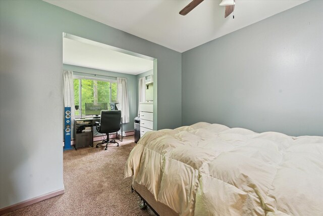 6544 Woodland Rd, Whitmore Lake, MI 48189 - bedroom featuring carpet, a ceiling fan, an office area, and baseboards