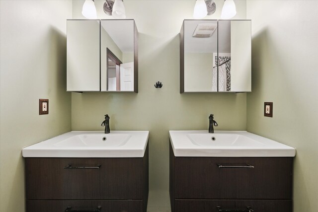 6544 Woodland Rd, Whitmore Lake, MI 48189 - bathroom with two vanities