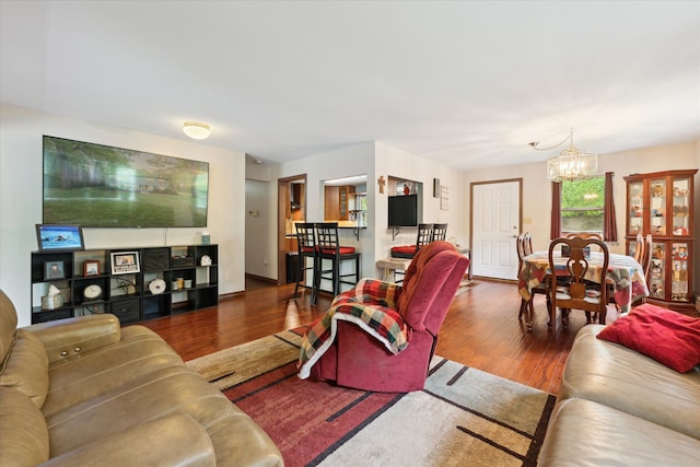 6544 Woodland Rd, Whitmore Lake, MI 48189 - living area with a chandelier and wood finished floors