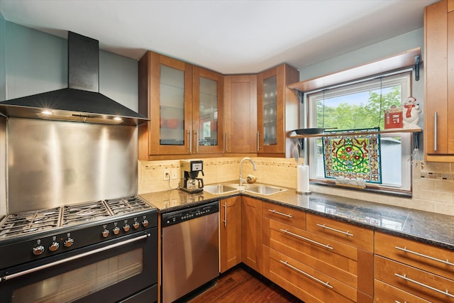 6544 Woodland Rd, Whitmore Lake, MI 48189 - kitchen with wall chimney exhaust hood, stainless steel dishwasher, black gas stove, and brown cabinetry