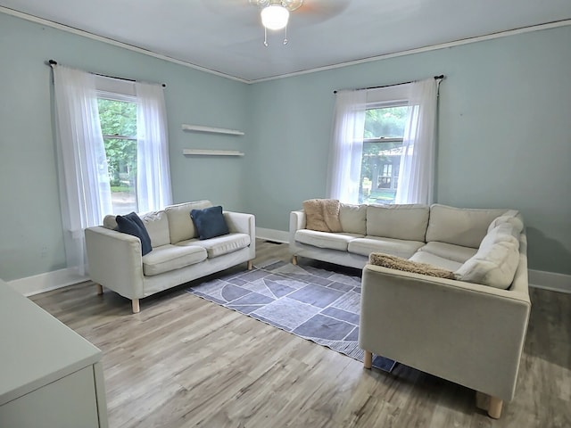 5014 Ford St, Swartz Creek, MI 48473 - living room with light wood finished floors, baseboards, ceiling fan, and ornamental molding