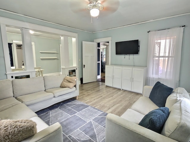5014 Ford St, Swartz Creek, MI 48473 - living room with a ceiling fan, light wood finished floors, and a fireplace