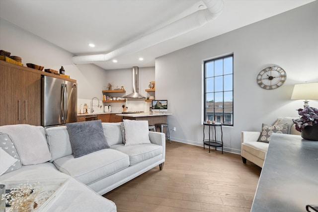 804 N Main St Unit 2C, Rochester, MI 48307 - living area featuring recessed lighting, light wood-type flooring, and baseboards