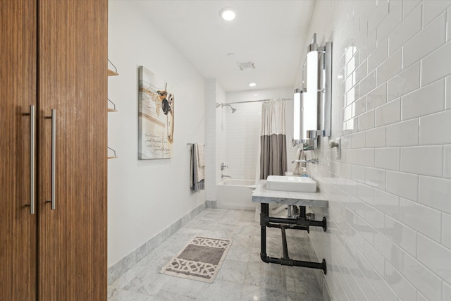 804 N Main St Unit 2C, Rochester, MI 48307 - full bathroom featuring shower / bath combo with shower curtain, a sink, recessed lighting, radiator, and marble finish flooring