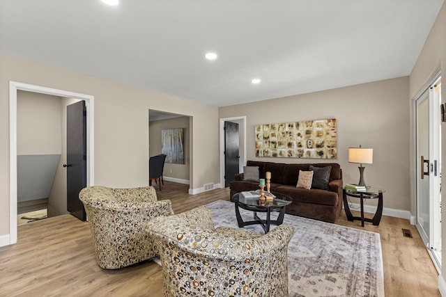 8903 Appleton, Redford, MI 48239 - living room with light wood finished floors, baseboards, and recessed lighting