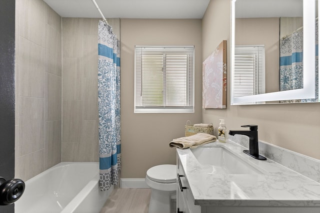 8903 Appleton, Redford, MI 48239 - full bathroom featuring toilet, vanity, shower / bath combo, wood finished floors, and baseboards