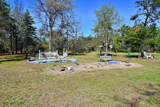 2741 E M 72, Grayling, MI 49738 - view of green lawn with view of wooded area