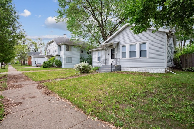 533 W Ganson St, Jackson, MI 49201 - view of front of home featuring a front yard