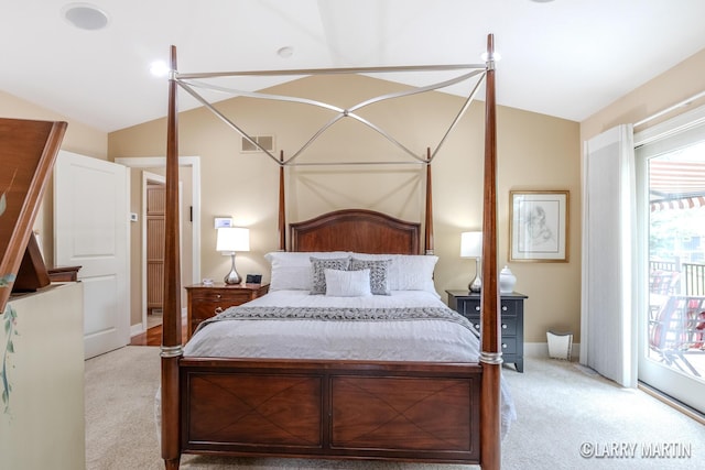 7708 Stations Dr SW, Byron Center, MI 49315 - bedroom with vaulted ceiling, carpet, and access to outside