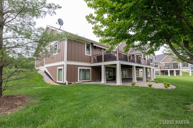 7708 Stations Dr SW, Byron Center, MI 49315 - back of house with a lawn, a deck, and board and batten siding