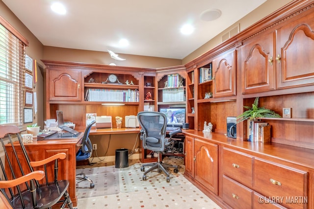 7708 Stations Dr SW, Byron Center, MI 49315 - home office with built in desk and light flooring