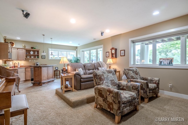 7708 Stations Dr SW, Byron Center, MI 49315 - living area with recessed lighting, light colored carpet, and baseboards