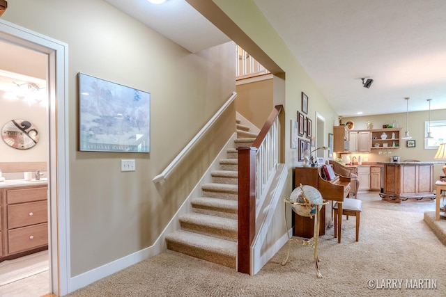 7708 Stations Dr SW, Byron Center, MI 49315 - stairs featuring carpet and baseboards