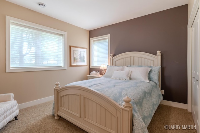 7708 Stations Dr SW, Byron Center, MI 49315 - bedroom with light carpet and baseboards