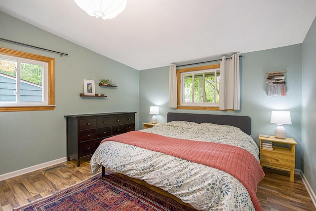 2753 Cumberland Ave, Ann Arbor, MI 48104 - bedroom featuring vaulted ceiling, baseboards, and wood finished floors