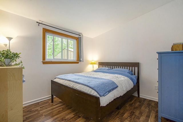 2753 Cumberland Ave, Ann Arbor, MI 48104 - bedroom featuring wood finished floors, baseboards, and vaulted ceiling