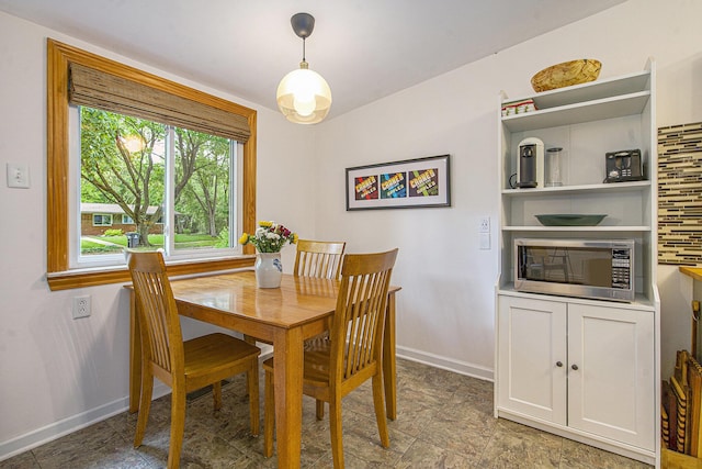 2753 Cumberland Ave, Ann Arbor, MI 48104 - dining space with baseboards and stone finish flooring