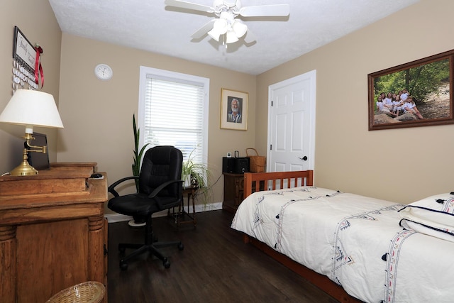 113 Davis Dr, Brooklyn, MI 49230 - bedroom with dark wood finished floors, an office area, and a ceiling fan