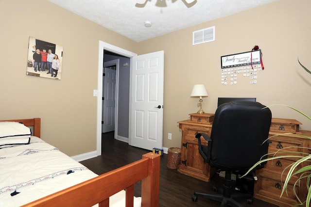 113 Davis Dr, Brooklyn, MI 49230 - bedroom with wood finished floors, a desk, baseboards, and ceiling fan