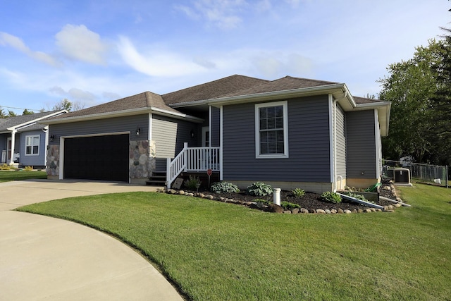 113 Davis Dr, Brooklyn, MI 49230 - view of front of home with an attached garage, driveway, and central air condition unit