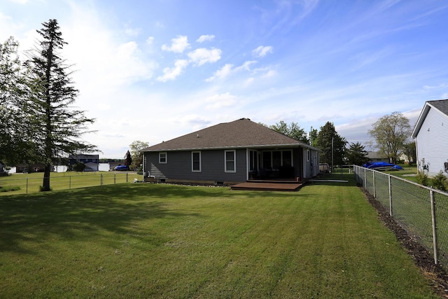 113 Davis Dr, Brooklyn, MI 49230 - back of property featuring a deck and roof with shingles