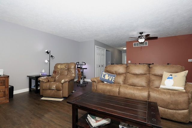 113 Davis Dr, Brooklyn, MI 49230 - living area with baseboards, a ceiling fan, wood finished floors, and a textured ceiling