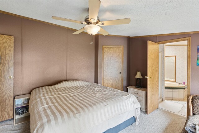 9168 Clewley Rd, Lachine, MI 49753 - bedroom with ornamental molding, ceiling fan, a textured ceiling, and ensuite bath