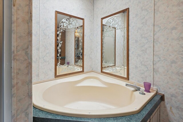9168 Clewley Rd, Lachine, MI 49753 - full bathroom featuring a bath