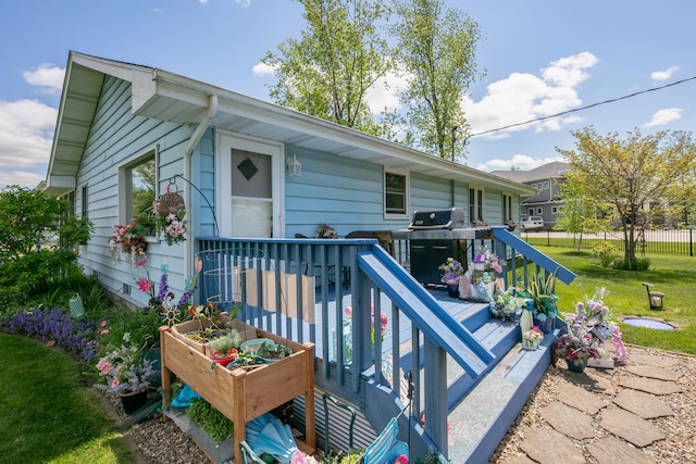 65805 S St, Cassopolis, MI 49031 - deck featuring a lawn and a grill