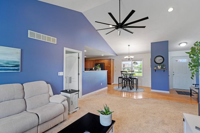 24346 Vargas Dr, Mattawan, MI 49071 - living area featuring a chandelier, a ceiling fan, light carpet, recessed lighting, and baseboards