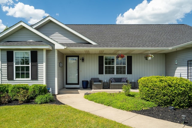24346 Vargas Dr, Mattawan, MI 49071 - view of front of property with covered porch, a shingled roof, and board and batten siding