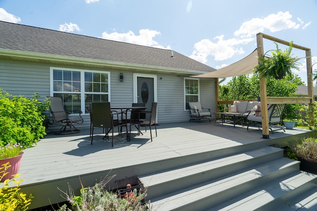 24346 Vargas Dr, Mattawan, MI 49071 - wooden terrace with outdoor lounge area and outdoor dining area