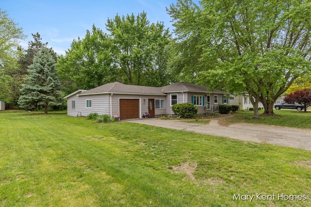756 66th St SE, Grand Rapids, MI 49548 - ranch-style house featuring a garage, a front lawn, and driveway