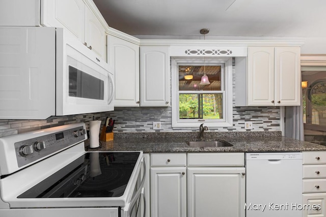 756 66th St SE, Grand Rapids, MI 49548 - kitchen featuring white appliances, a sink, white cabinetry, and decorative backsplash