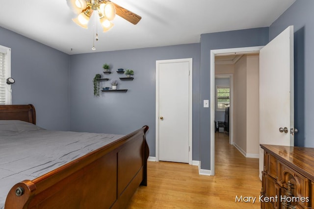 756 66th St SE, Grand Rapids, MI 49548 - bedroom featuring light wood finished floors and baseboards