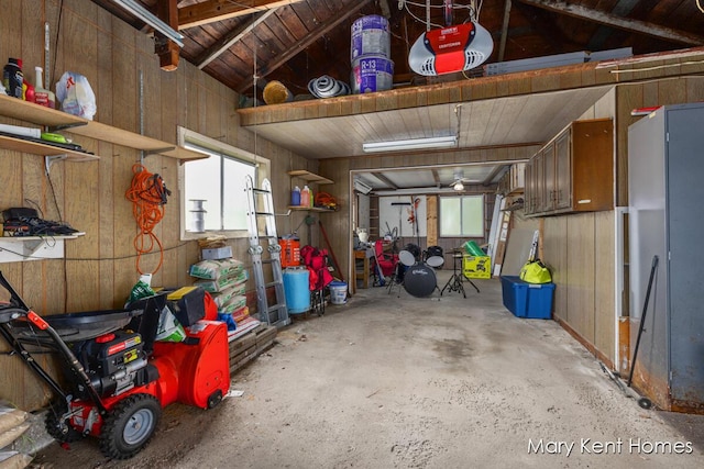 756 66th St SE, Grand Rapids, MI 49548 - garage featuring a garage door opener