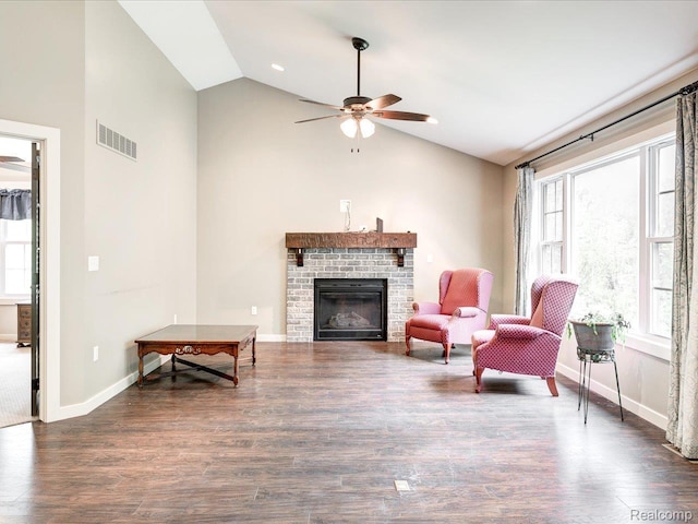 5076 Birch Ave, Lexington, MI 48450 - living room featuring ceiling fan, a brick fireplace, wood finished floors, high vaulted ceiling, and baseboards
