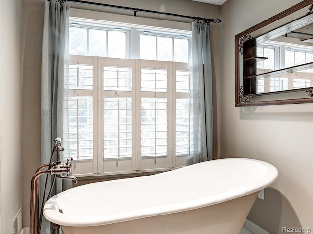 5076 Birch Ave, Lexington, MI 48450 - full bath featuring baseboards and a soaking tub