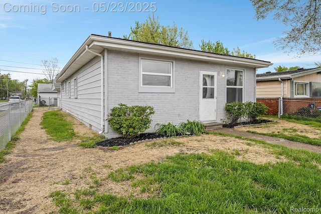 464 W Jarvis Ave, Hazel Park, MI 48030 - view of side of property featuring brick siding and entry steps
