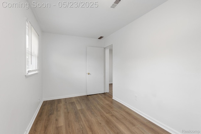 464 W Jarvis Ave, Hazel Park, MI 48030 - spare room with wood finished floors and baseboards