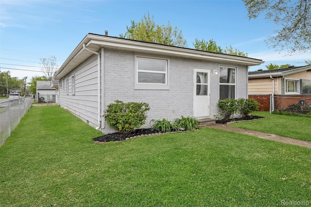 464 W Jarvis Ave, Hazel Park, MI 48030 - rear view of house with brick siding and entry steps
