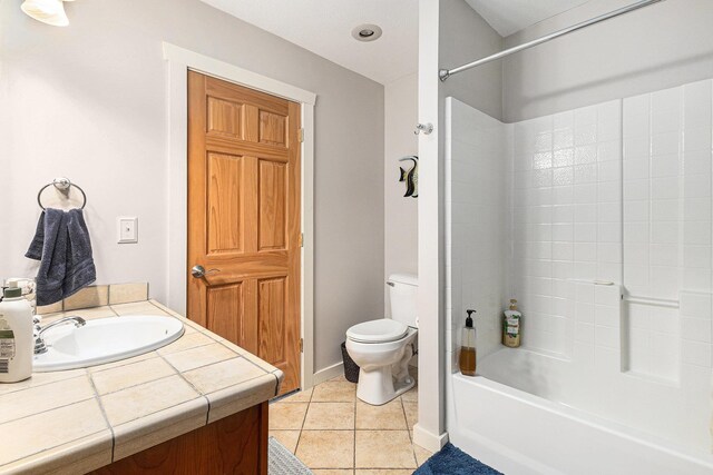 5301 Durga Rd, Williamsburg, MI 49690 - full bathroom with toilet, vanity, shower / bath combination, and tile patterned floors