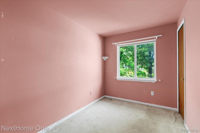 7469 Longworth Dr, Brighton, MI 48116 - carpeted empty room with baseboards