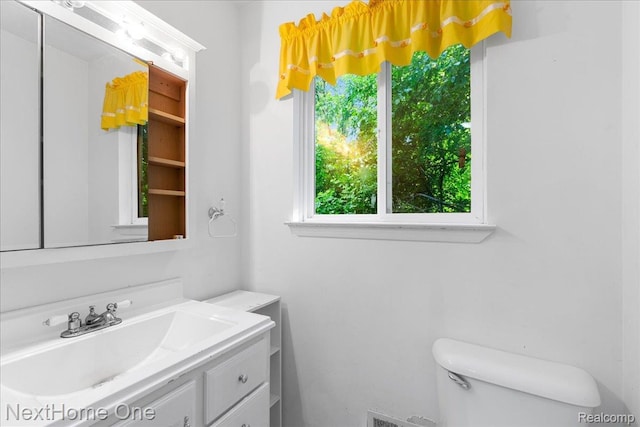 7469 Longworth Dr, Brighton, MI 48116 - half bathroom with toilet and vanity
