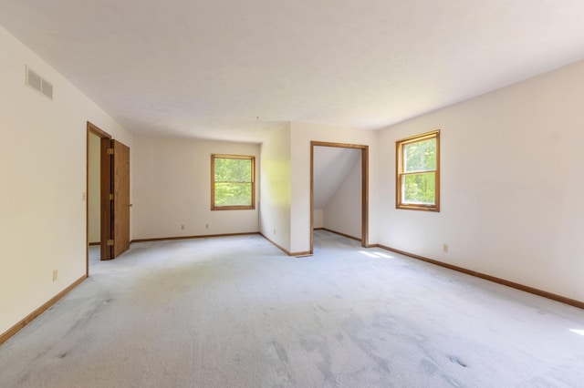 10109 Lauer Rd, Baroda, MI 49101 - unfurnished room with plenty of natural light, light colored carpet, and baseboards
