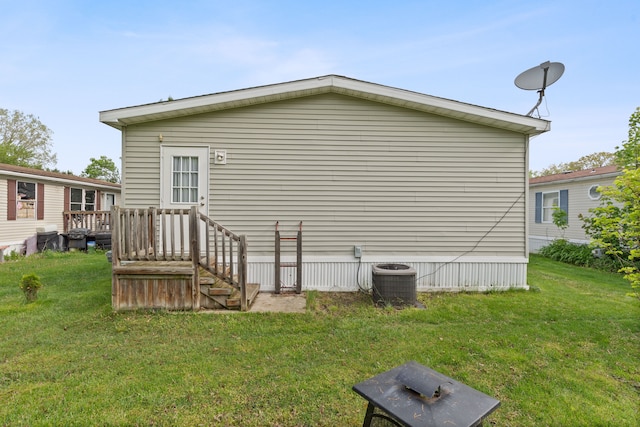 165LOT220 S Opdyke Rd, Auburn Hills, MI 48326 - rear view of property with central AC unit and a yard