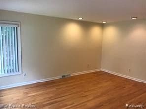 4139 Yorba Linda Blvd, Royal Oak, MI 48073 - spare room with baseboards, wood finished floors, and recessed lighting